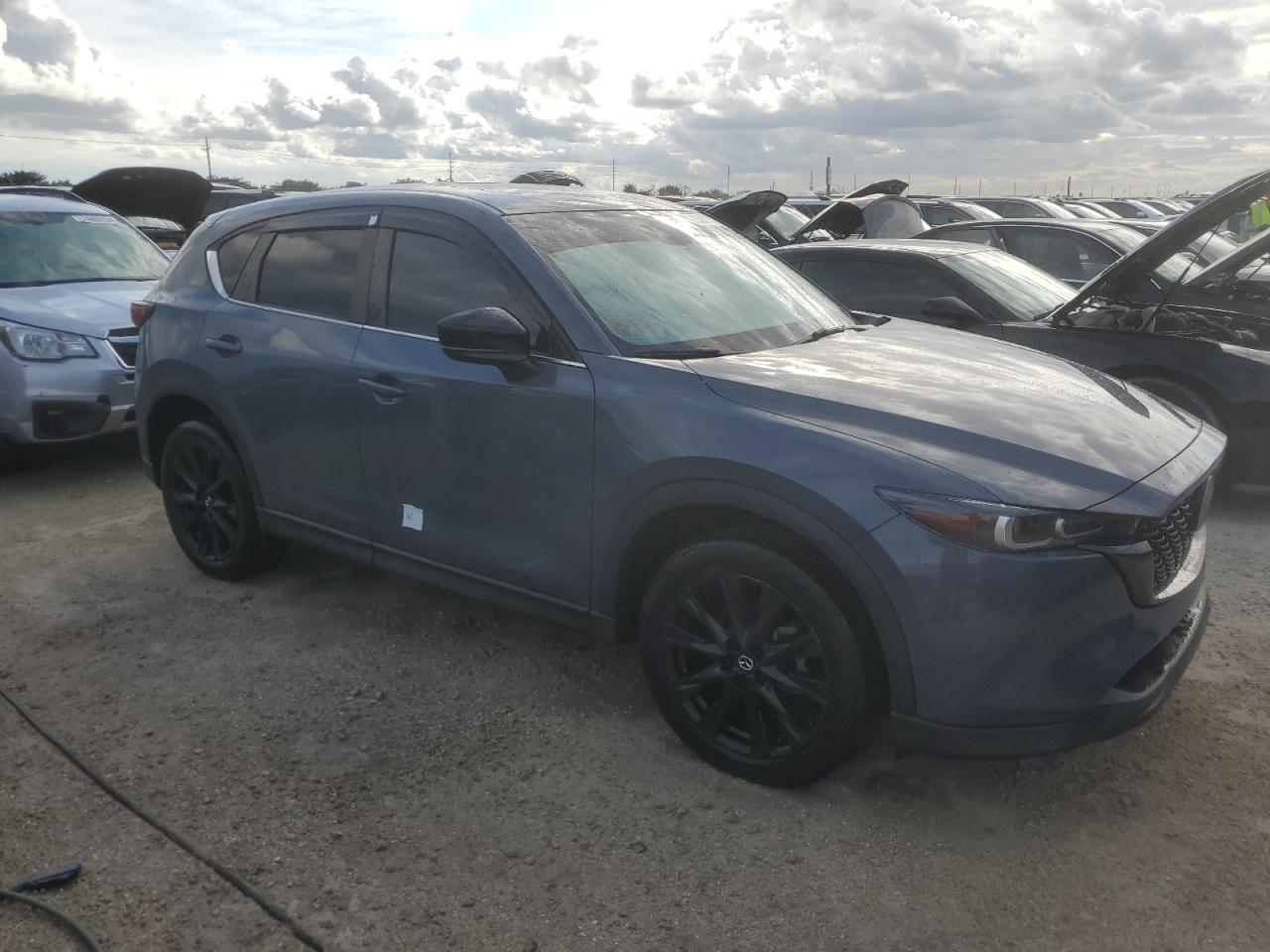 2022 Mazda CX-5 VIN JM3KFBCM1N0629363 Copart auction photo, water/flood damage thumbnail 4
