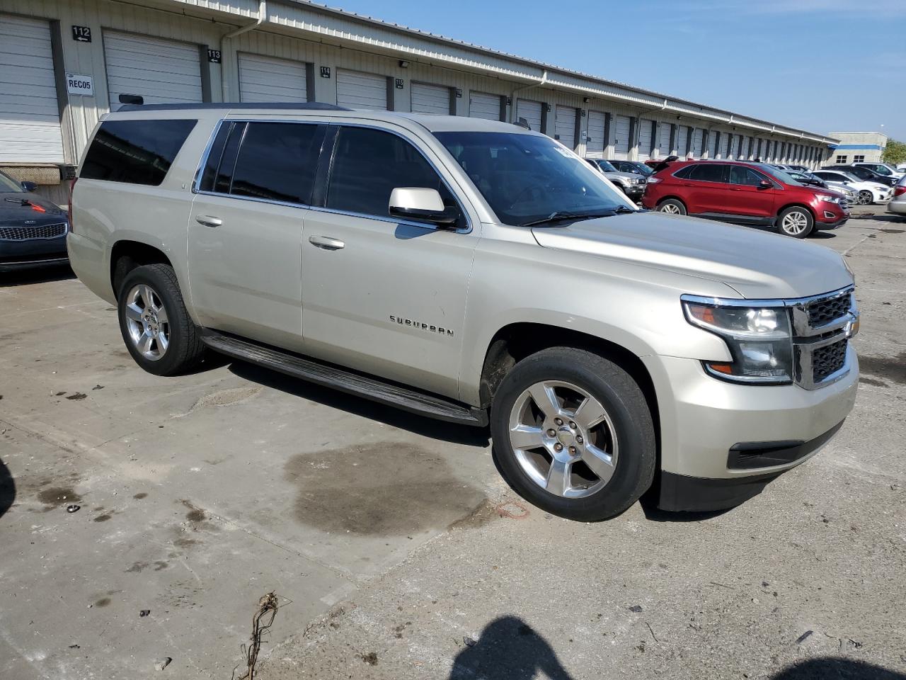 2015 Chevrolet Suburban VIN 1GNSKJKC6FR300654 Copart auction photo, rear end / side damage thumbnail 4