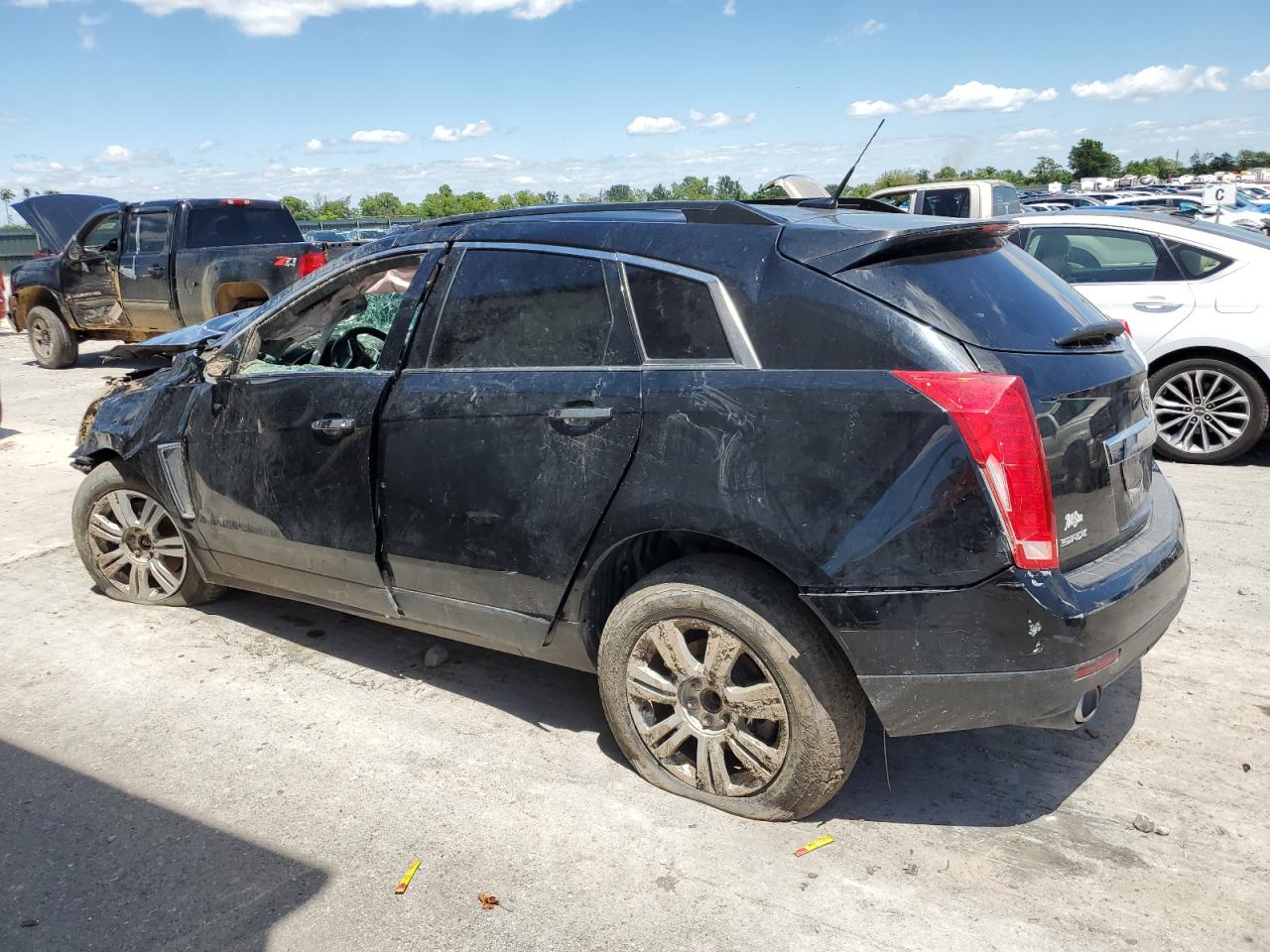 2013 Cadillac SRX VIN 3GYFNAE30DS639301 Copart auction photo, all over damage thumbnail 2