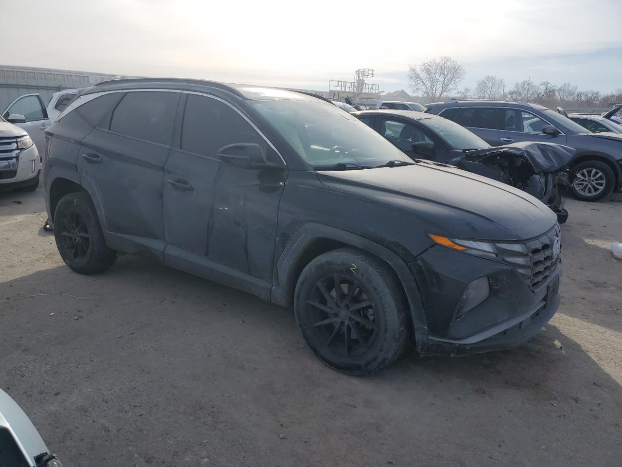 2022 Hyundai Tucson VIN 5NMJBCAE1NH033588 Copart auction photo, side / front end damage thumbnail 4