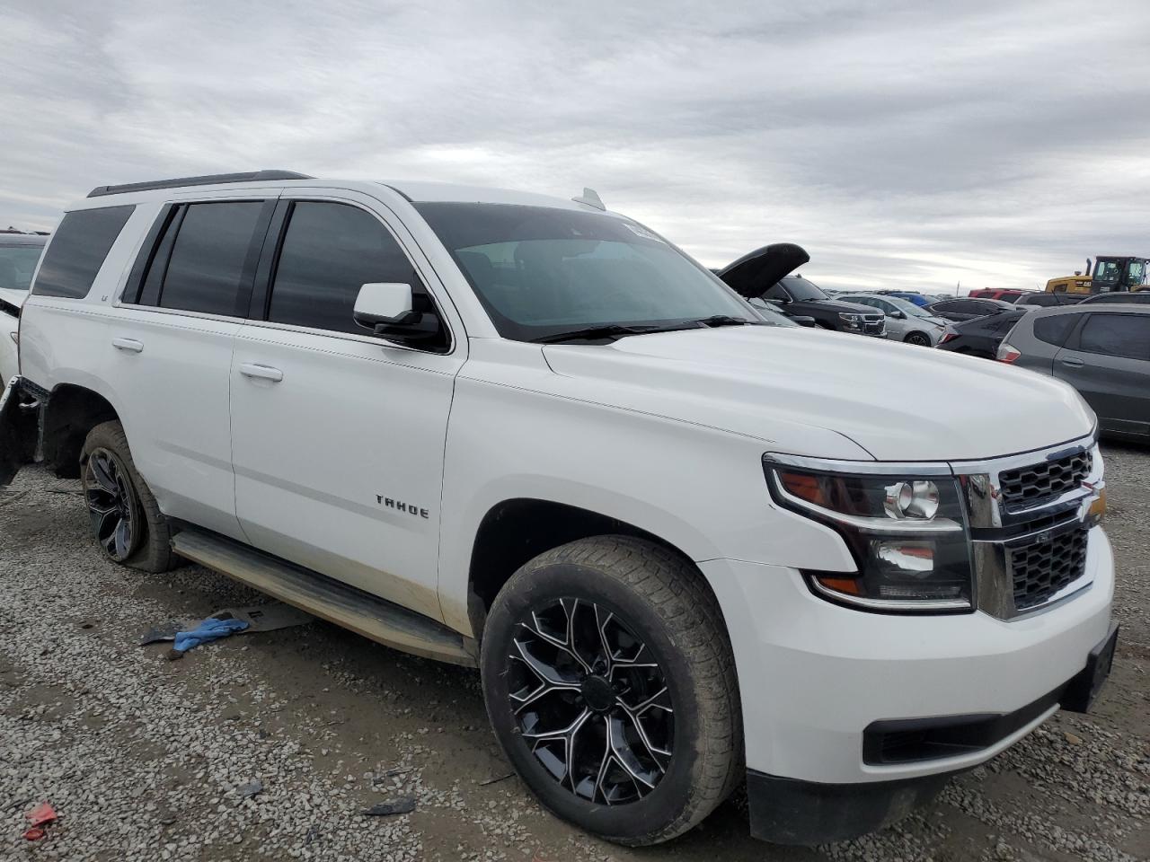 2015 Chevrolet Tahoe VIN 1GNSKBKCXFR561226 Copart auction photo, all over damage thumbnail 4