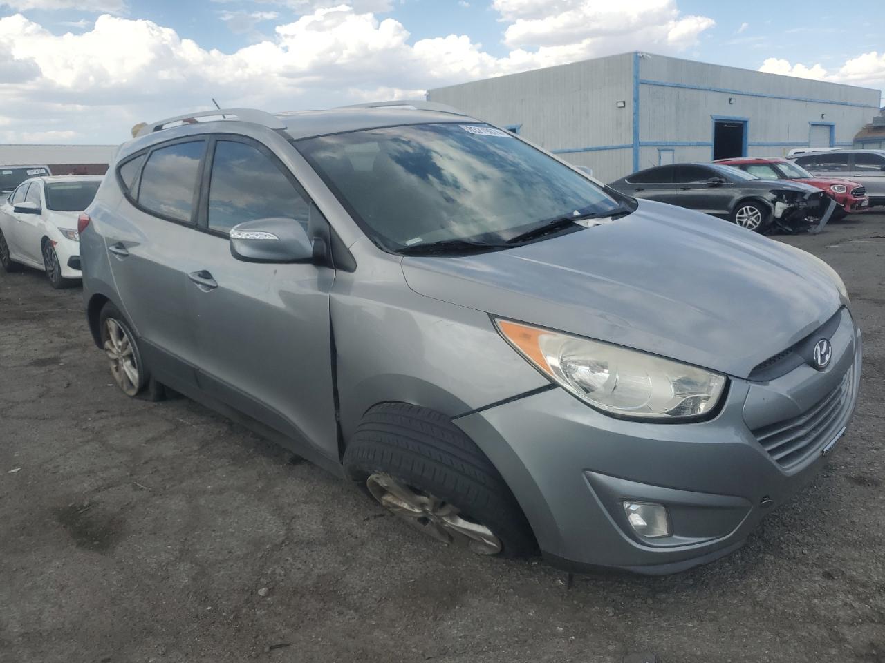 2013 Hyundai Tucson VIN KM8JU3AC2DU742848 Copart auction photo, all over damage thumbnail 4