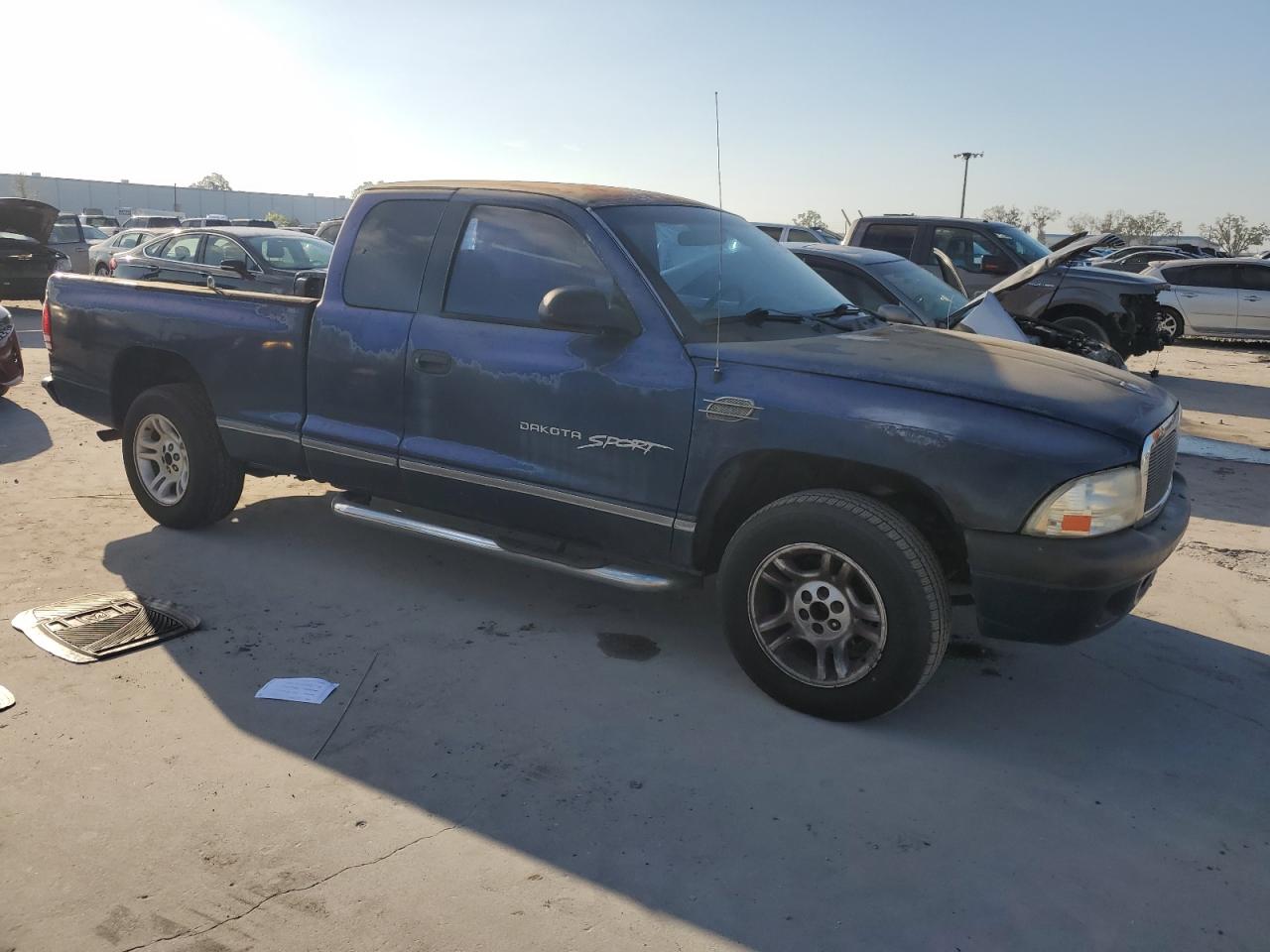2001 Dodge Dakota VIN 1B7GL22X71S342417 Copart auction photo, rear end / side damage thumbnail 4