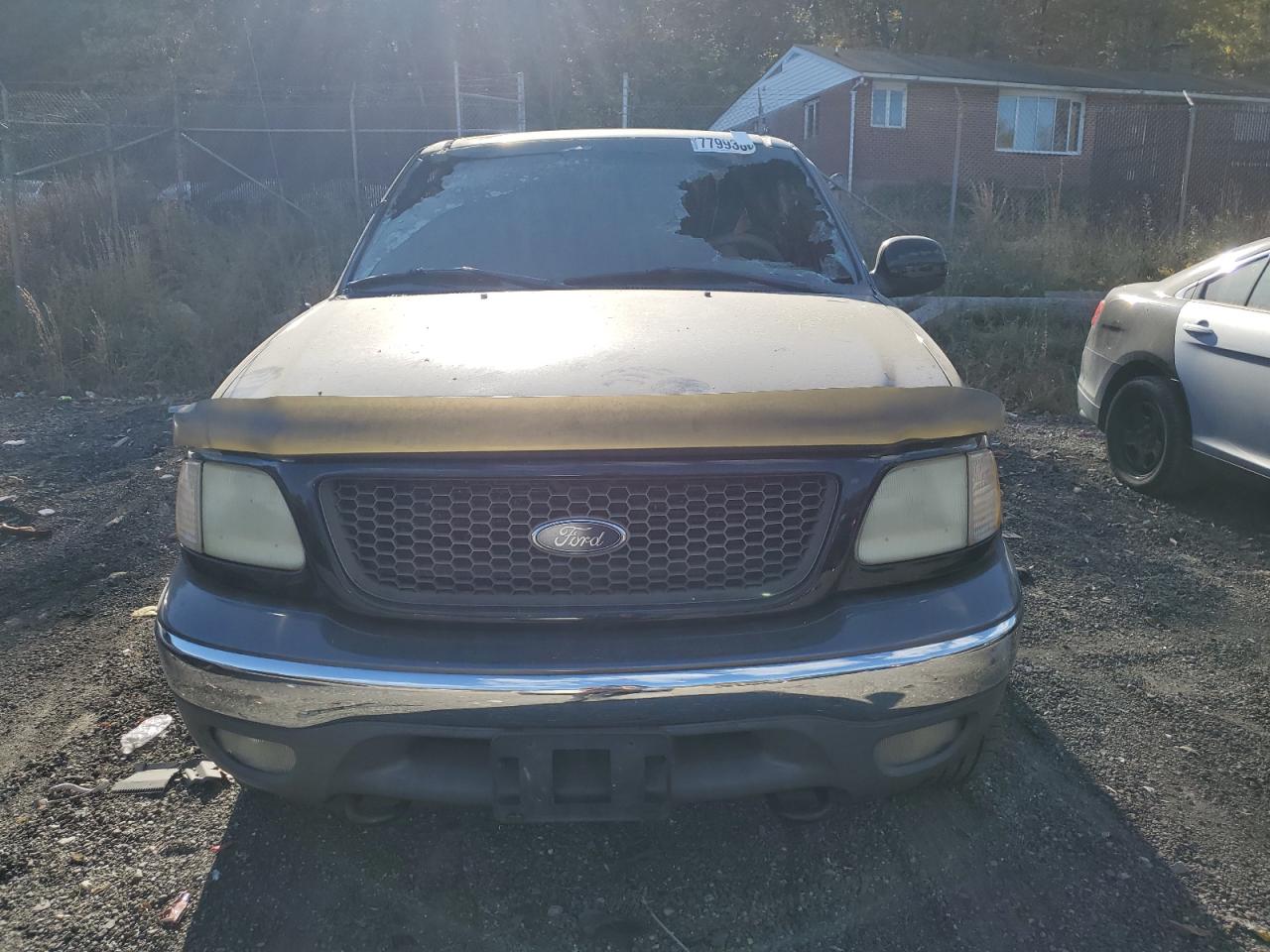 2003 Ford F-150 VIN 2FTRX08L93CA22948 Copart auction photo, burn damage thumbnail 5
