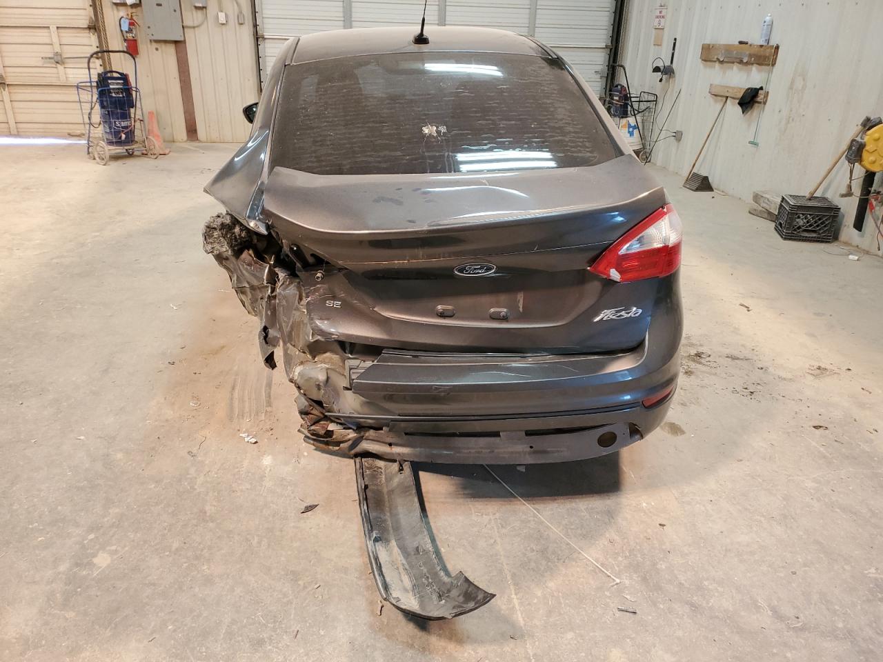 2015 Ford Fiesta VIN 3FADP4BJ8FM203739 Copart auction photo, rear end / undercarriage damage thumbnail 6