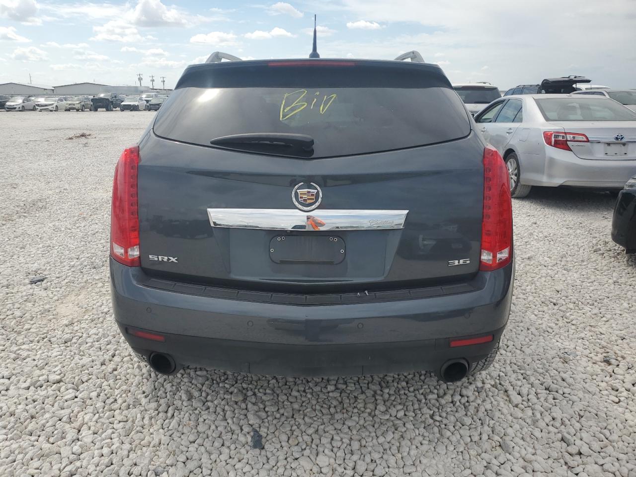 2013 Cadillac SRX VIN 3GYFNEE39DS509914 Copart auction photo, side damage thumbnail 6