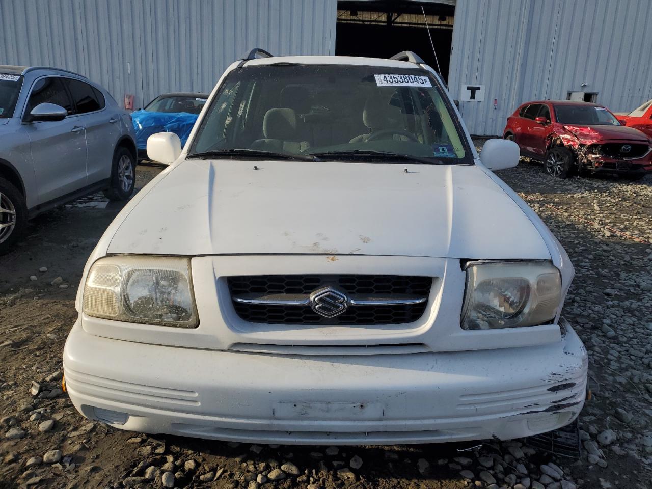 2000 Suzuki Grand Vitara VIN JS3TD62V4Y4121259 Copart auction photo, front end / rear end damage thumbnail 5