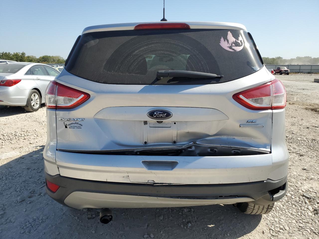 2016 Ford Escape VIN 1FMCU0G93GUC42141 Copart auction photo, all over damage thumbnail 6
