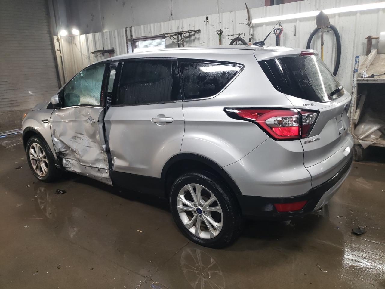2017 Ford Escape VIN 1FMCU9GD0HUC07888 Copart auction photo, side damage thumbnail 2