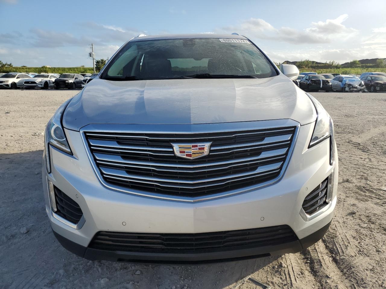 2018 Cadillac XT5 VIN 1GYKNCRS9JZ106549 Copart auction photo, side / rear end damage thumbnail 5
