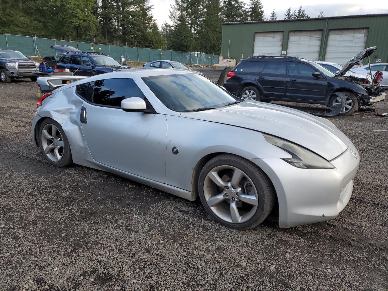 2009 Nissan 370Z VIN JN1AZ44E99M400557 Copart auction photo, rear end damage thumbnail 4