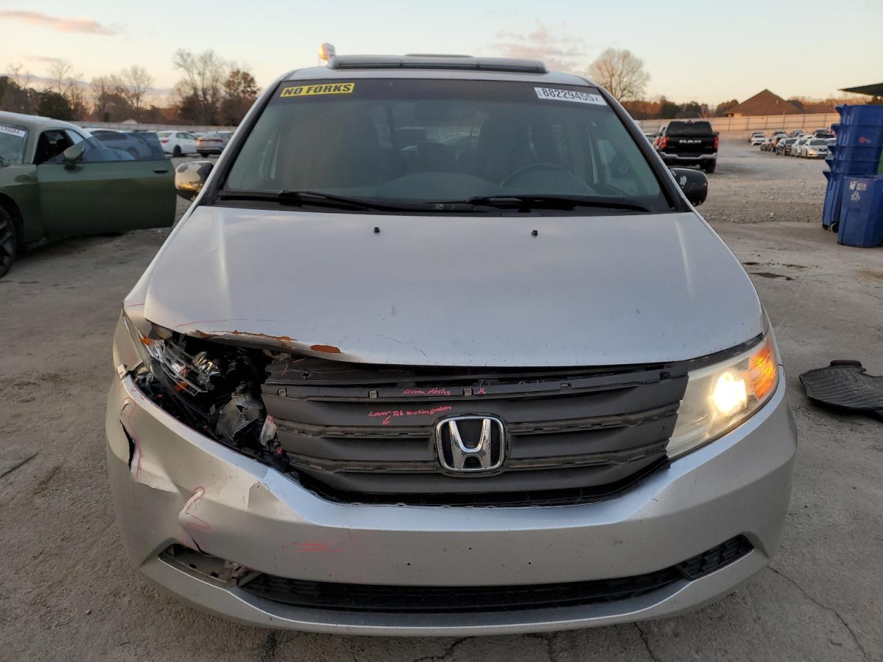 2012 Honda Odyssey VIN 5FNRL5H63CB063765 Copart auction photo, front end / minor dent/scratches damage thumbnail 5