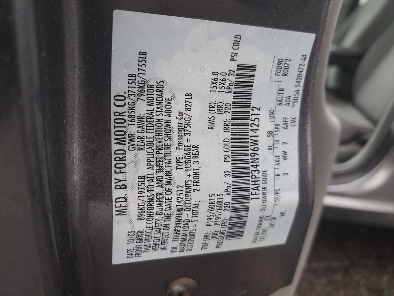 2006 Ford Focus VIN 1FAHP34N96W142512 Copart auction photo, all over damage thumbnail 12