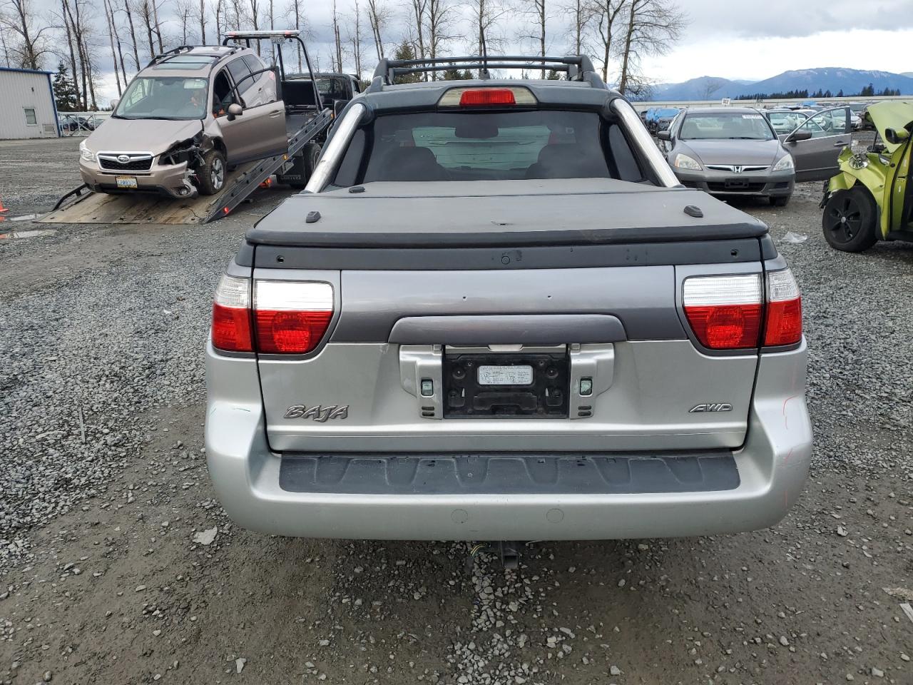 2005 Subaru Baja VIN 4S4BT63CX55105594 Copart auction photo, minor dent/scratches damage thumbnail 6
