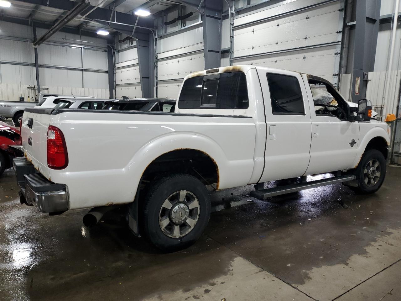 2011 Ford F350 VIN 1FT8W3BT5BEC99839 Copart auction photo, burn - interior damage thumbnail 3