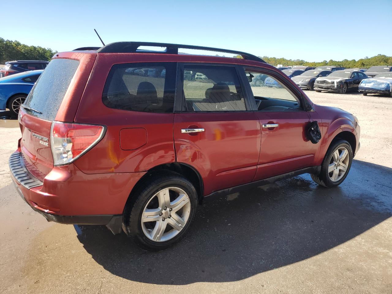 2010 Subaru Forester VIN JF2SH6CC8AH806621 Copart auction photo, side damage thumbnail 3
