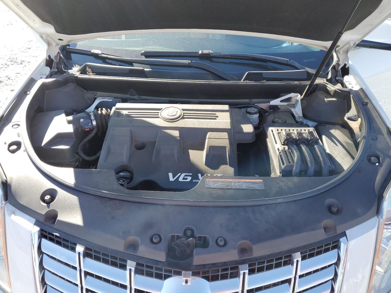 2015 Cadillac SRX VIN 3GYFNCE36FS574436 Copart auction photo, rear end damage thumbnail 12