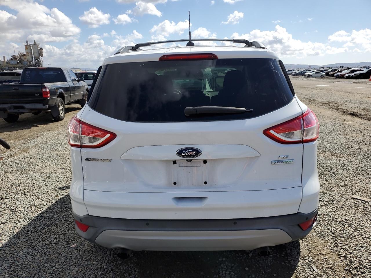 2015 Ford Escape VIN 1FMCU0GX7FUB07273 Copart auction photo, front end / rear end damage thumbnail 6
