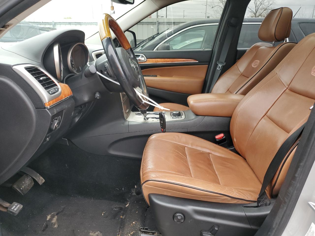 2012 Jeep Grand Cherokee VIN 1C4RJFCT3CC217865 Copart auction photo, side / rear end damage thumbnail 7