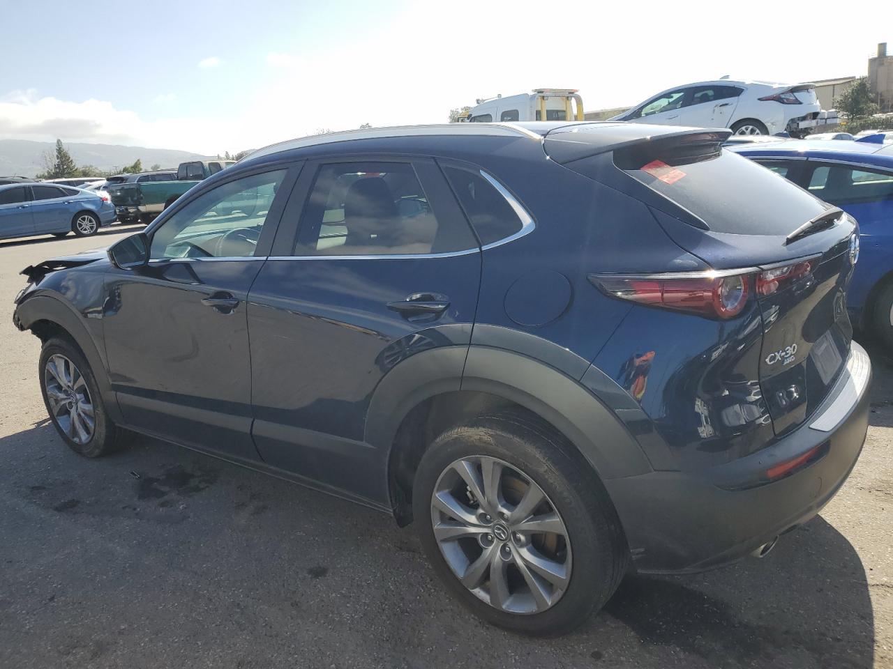 2023 Mazda CX-30 VIN 3MVDMBCM1PM582423 Copart auction photo, front end damage thumbnail 2