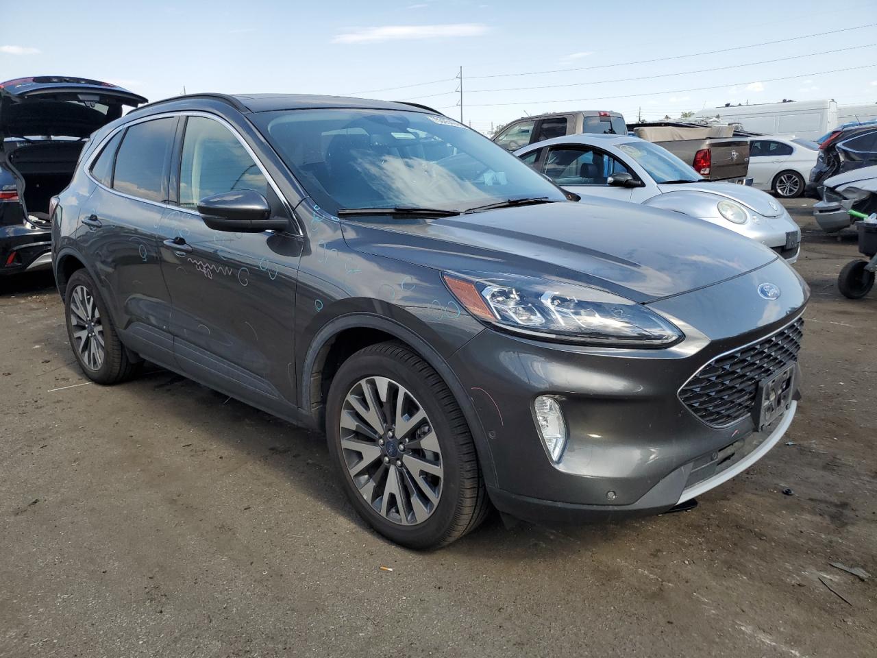 2020 Ford Escape VIN 1FMCU9J97LUA57890 Copart auction photo, hail damage thumbnail 4