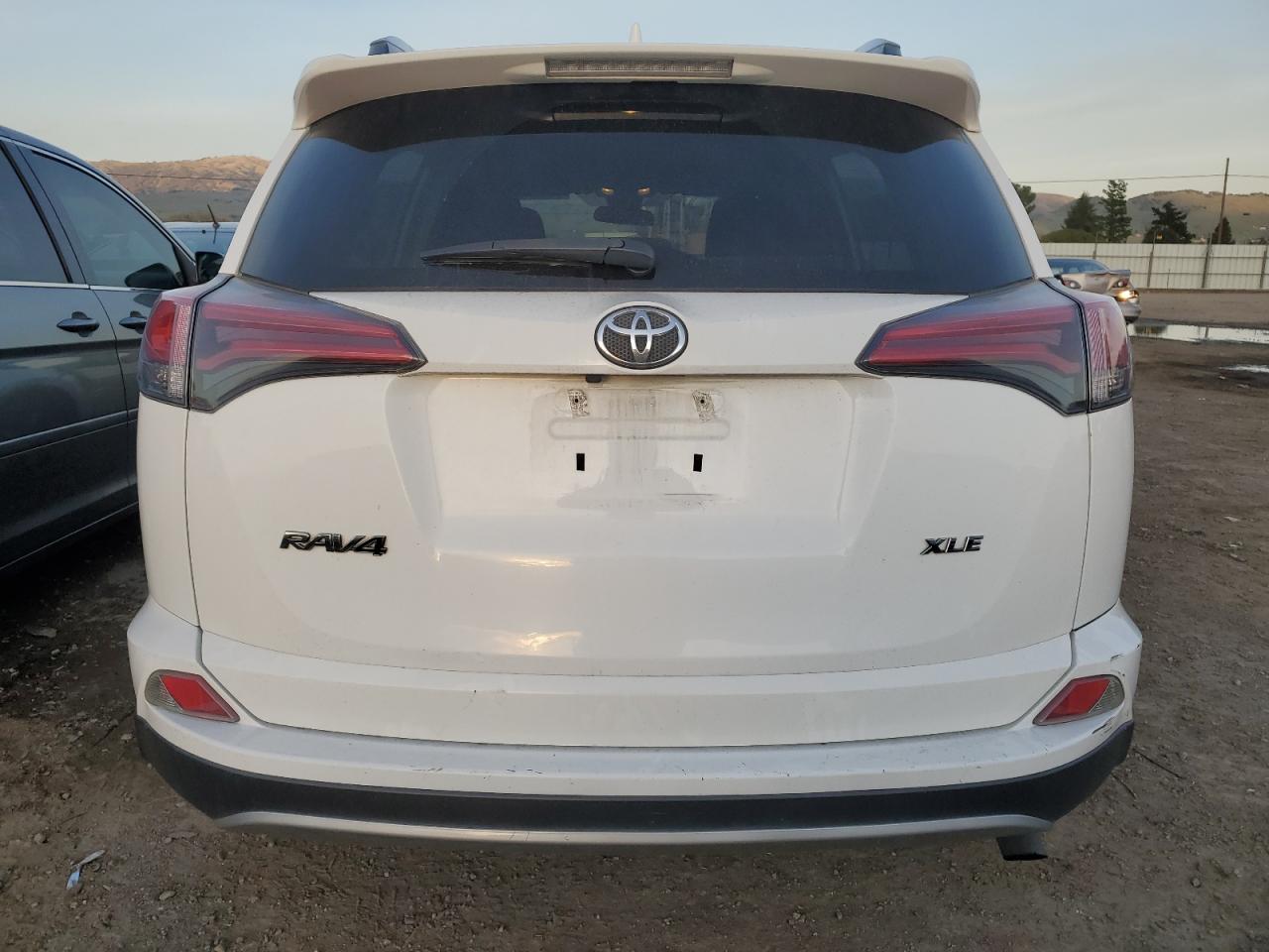 2018 Toyota RAV 4 VIN 2T3WFREV8JW435895 Copart auction photo, front end damage thumbnail 6