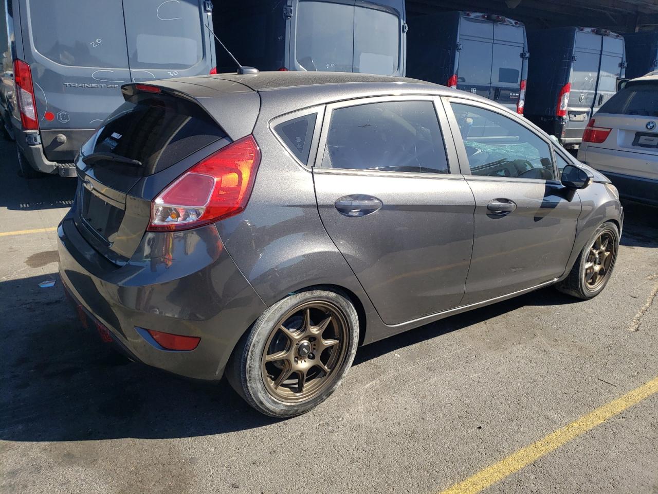 2016 Ford Fiesta VIN 3FADP4EJ0GM167610 Copart auction photo, all over damage thumbnail 3