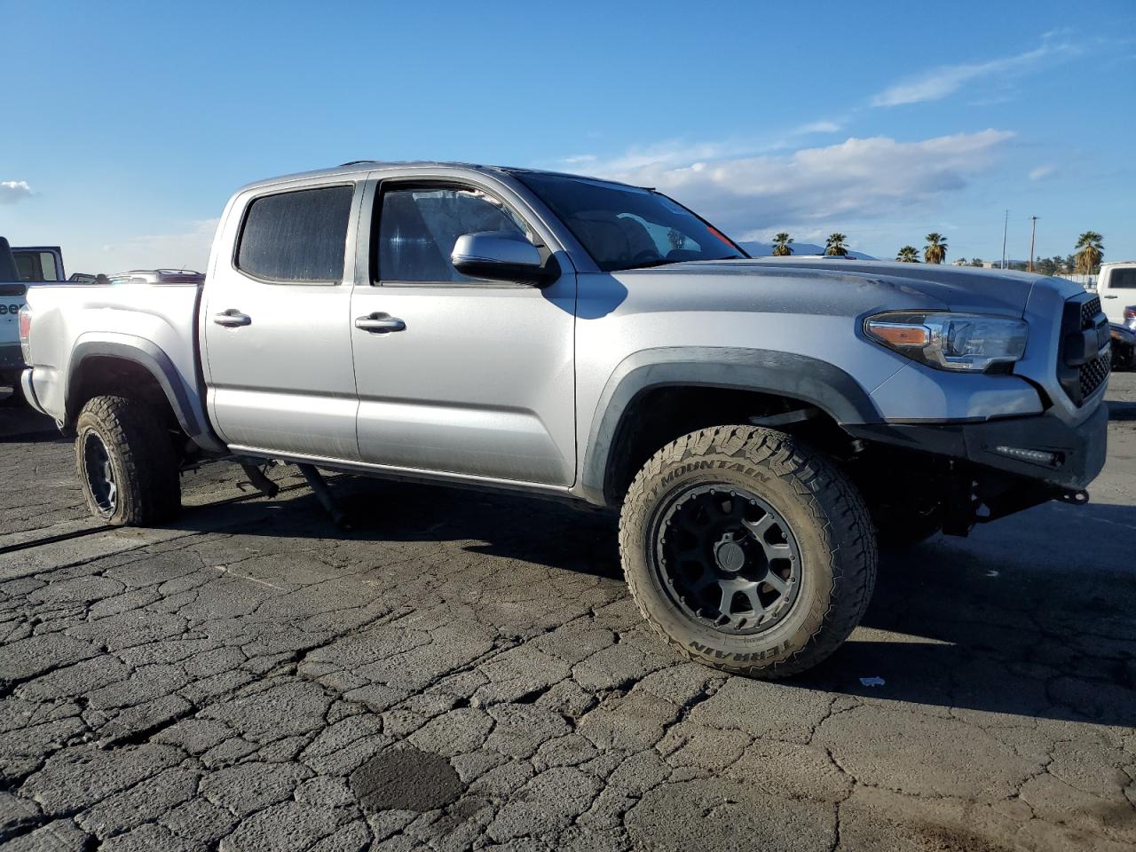 2017 Toyota Tacoma VIN 3TMCZ5AN3HM061085 Copart auction photo, rollover damage thumbnail 4