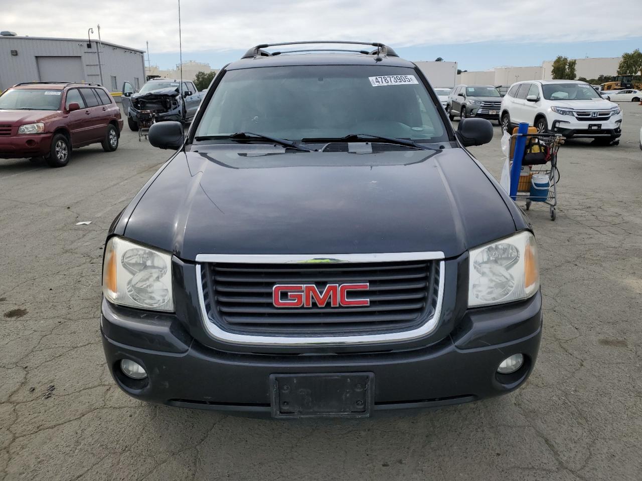 2004 GMC Envoy VIN 1GKES16S546100410 Copart auction photo, side / rear end damage thumbnail 5