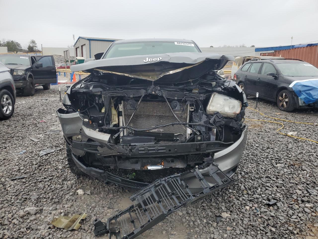 2012 Jeep Grand Cherokee VIN 1C4RJEAGXCC355578 Copart auction photo, front end damage thumbnail 5