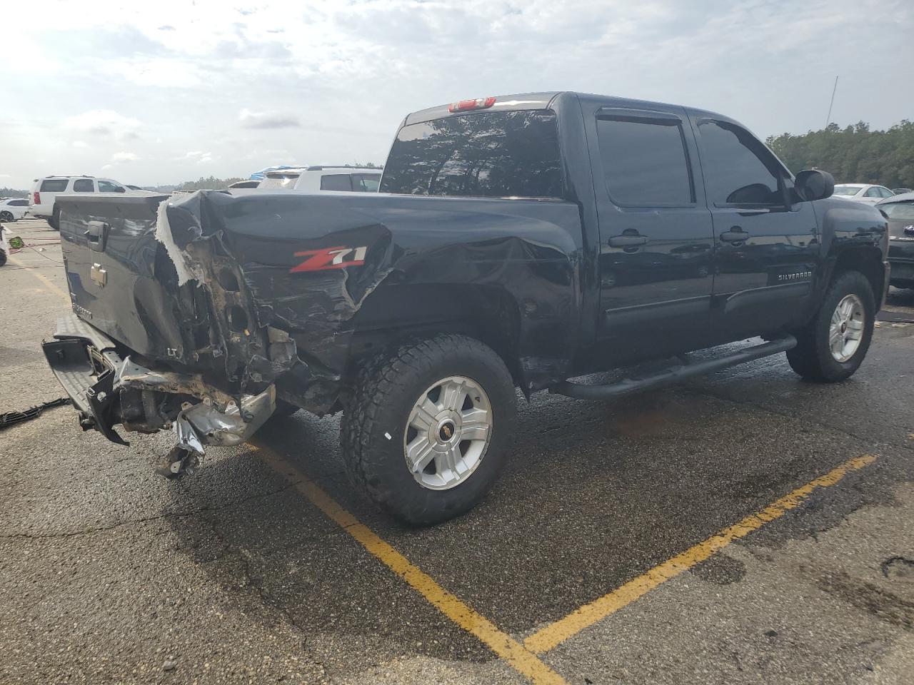 2011 Chevrolet Silverado VIN 3GCPCSE04BG392246 Copart auction photo, rear end / water/flood damage thumbnail 3