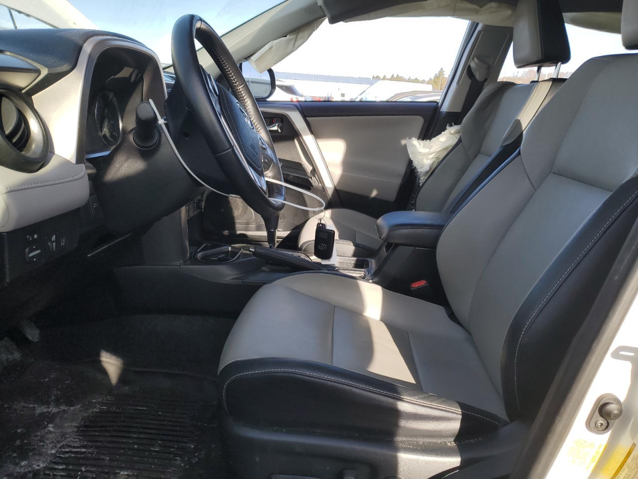 2018 Toyota RAV 4 VIN JTMDJREV0JD254647 Copart auction photo, side / rear end damage thumbnail 7