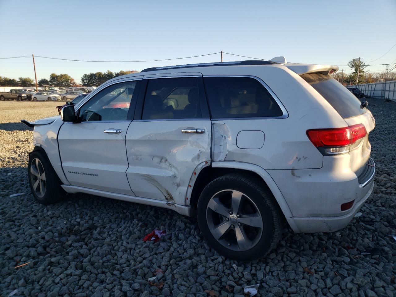 2015 Jeep Grand Cherokee VIN 1C4RJECG3FC125608 Copart auction photo, front end / side damage thumbnail 2