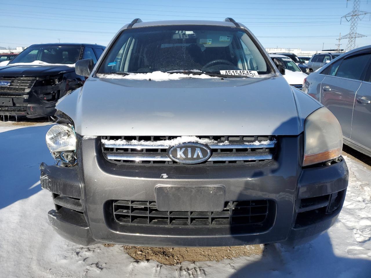 2007 KIA Sportage VIN KNDJF724677426143 Copart auction photo, front end damage thumbnail 5