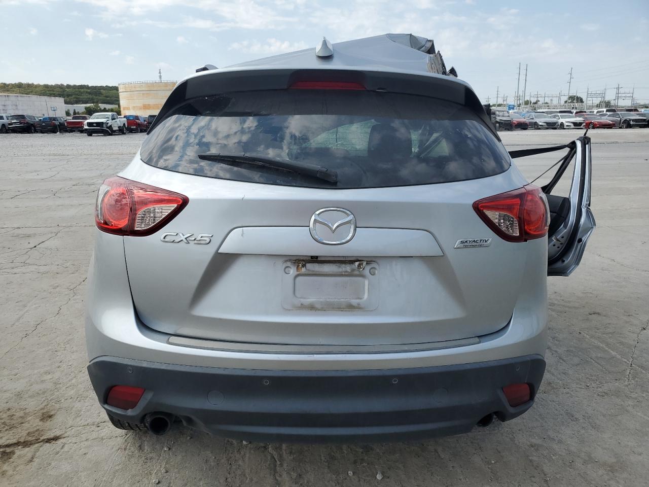 2016 Mazda CX-5 VIN JM3KE2DY9G0718394 Copart auction photo, all over / undercarriage damage thumbnail 6