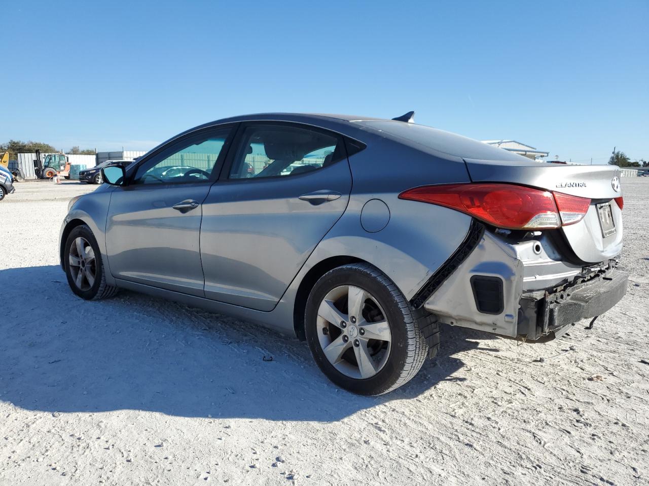 2012 Hyundai Elantra VIN KMHDH4AEXCU306126 Copart auction photo, rear end / minor dent/scratches damage thumbnail 2