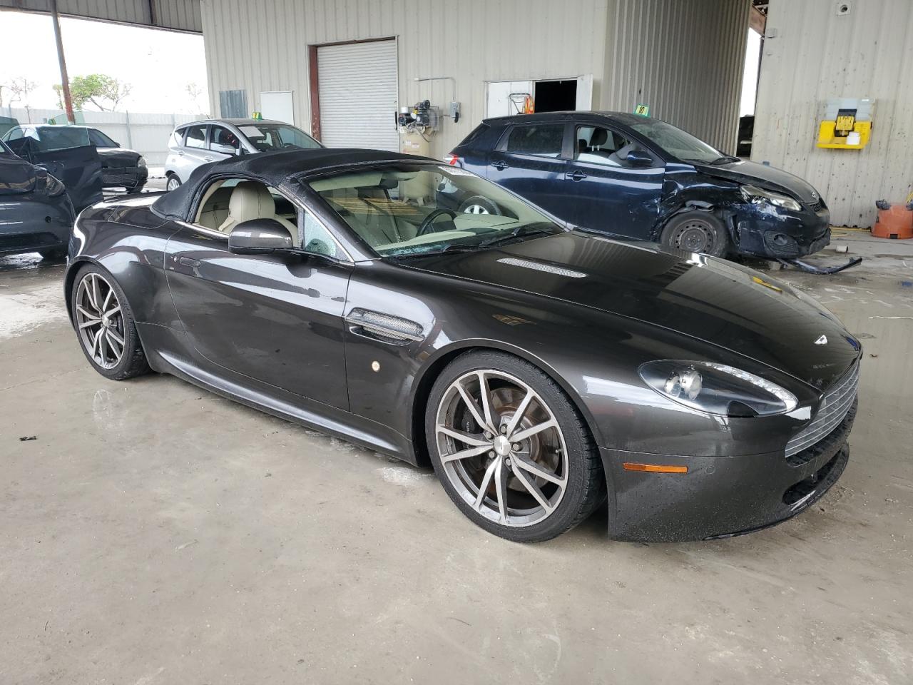 2010 Aston Martin Vantage VIN SCFEFBBCXAGD13755 Copart auction photo, water/flood damage thumbnail 4