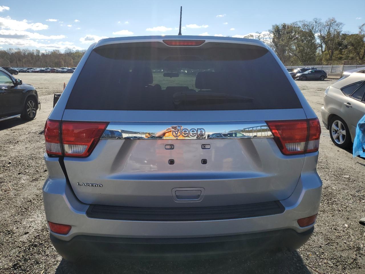 2012 Jeep Grand Cherokee VIN 1C4RJEAG8CC137431 Copart auction photo, side damage thumbnail 6