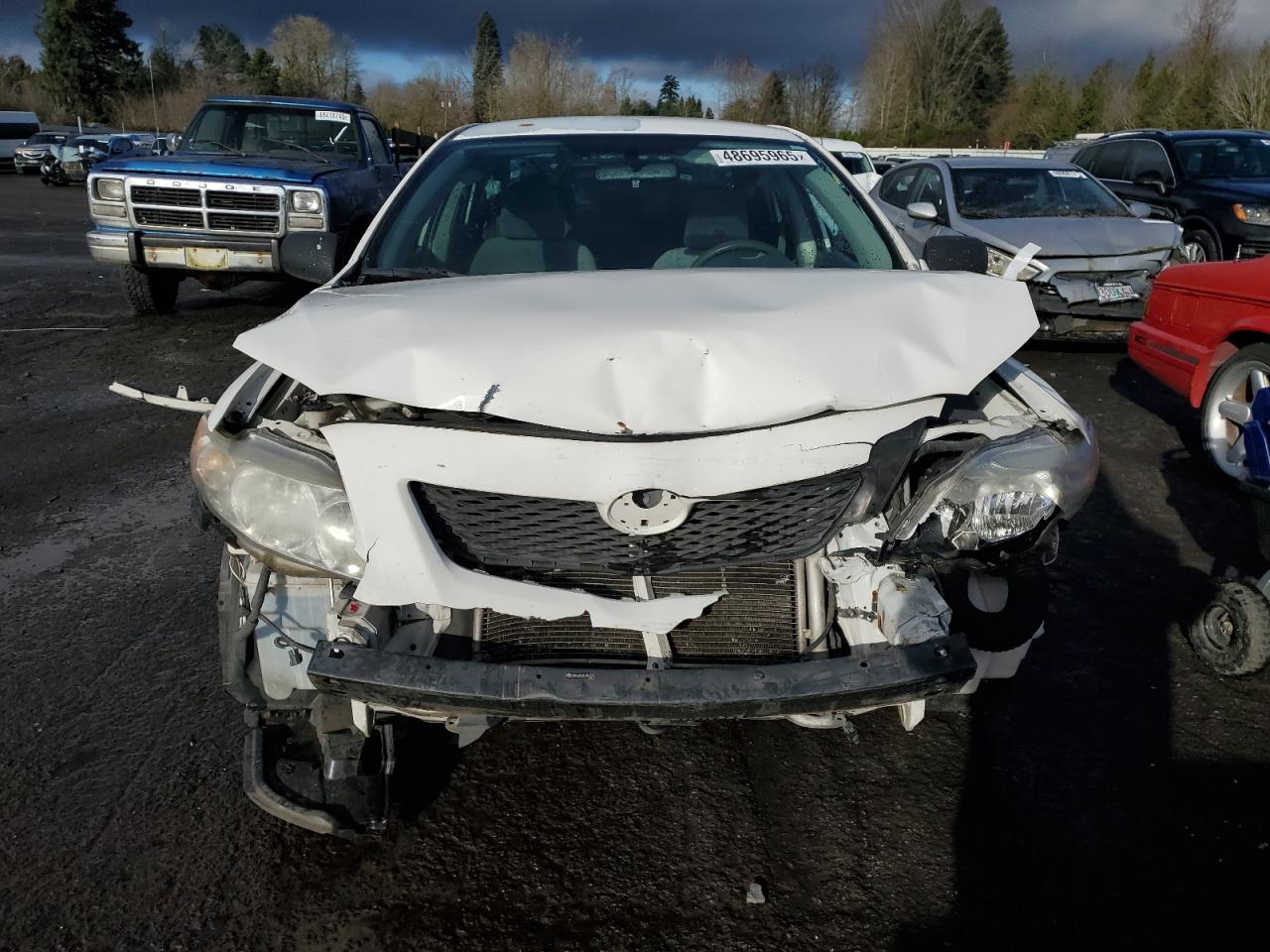 2010 Toyota Corolla VIN JTDBU4EE4AJ061775 Copart auction photo, front end / all over damage thumbnail 5