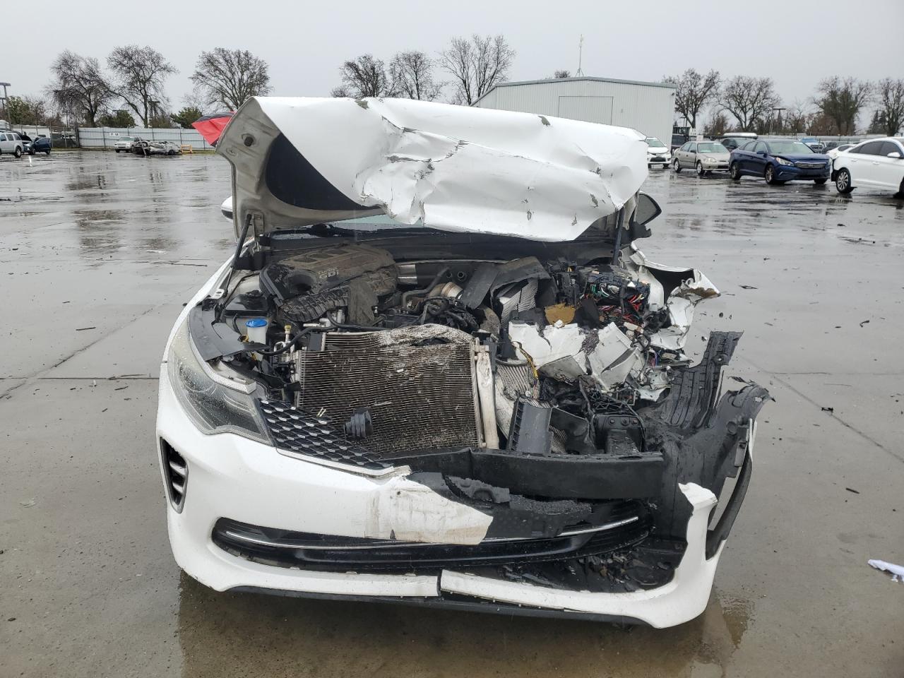 2016 KIA Optima VIN 5XXGW4L21GG085716 Copart auction photo, front end / side damage thumbnail 5
