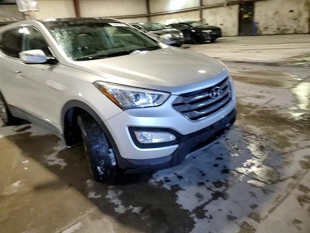 2013 Hyundai Santa Fe VIN 5XYZU3LB1DG031705 Copart auction photo, rear end / undercarriage damage thumbnail 12