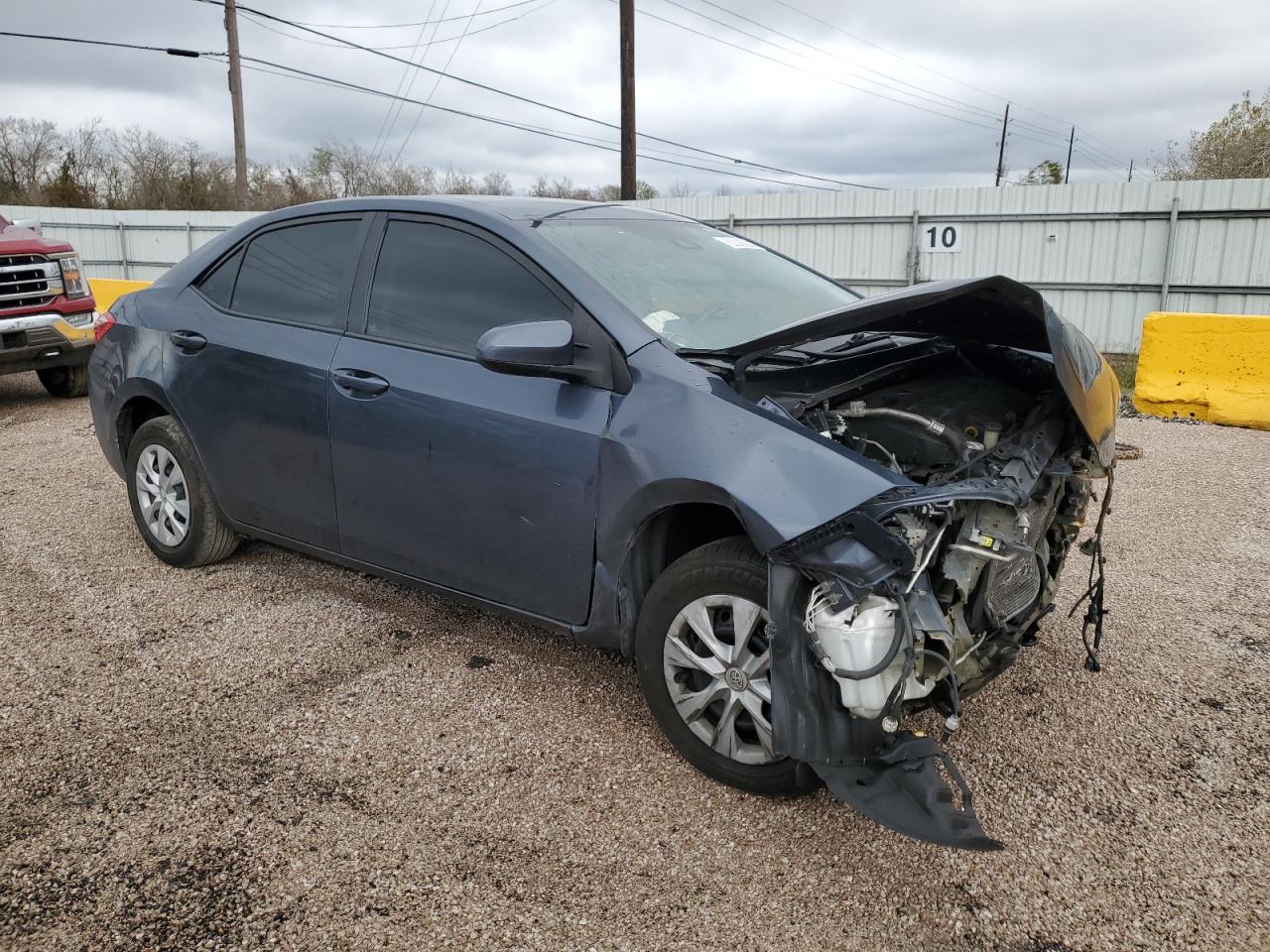 2018 Toyota Corolla VIN 5YFBURHE8JP796960 Copart auction photo, front end / all over damage thumbnail 4