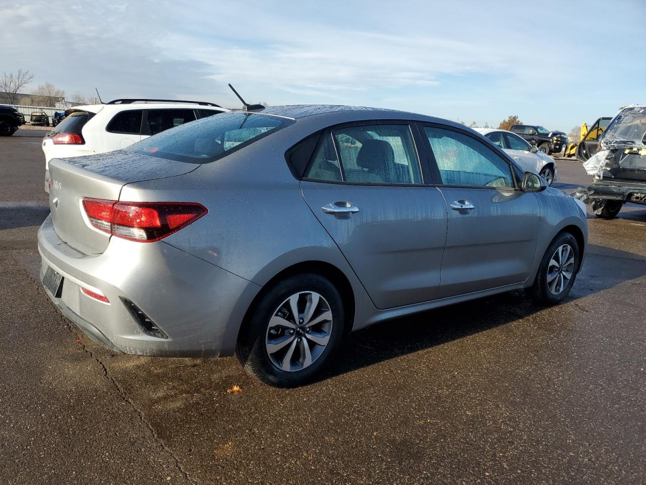 2023 KIA Rio VIN 3KPA24AD7PE568447 Copart auction photo, front end / side damage thumbnail 3