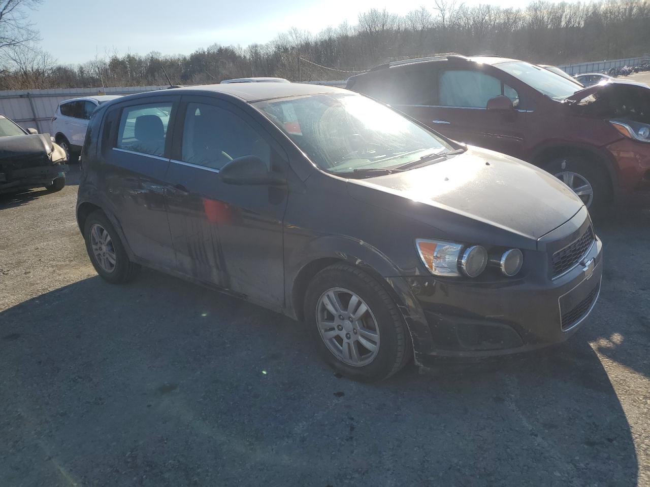 2015 Chevrolet Sonic VIN 1G1JC6SH1F4204883 Copart auction photo, rear end damage thumbnail 4