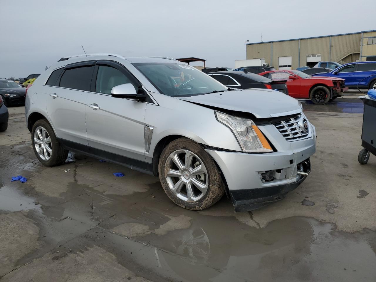 2015 Cadillac SRX VIN 3GYFNCE33FS593980 Copart auction photo, front end damage thumbnail 4