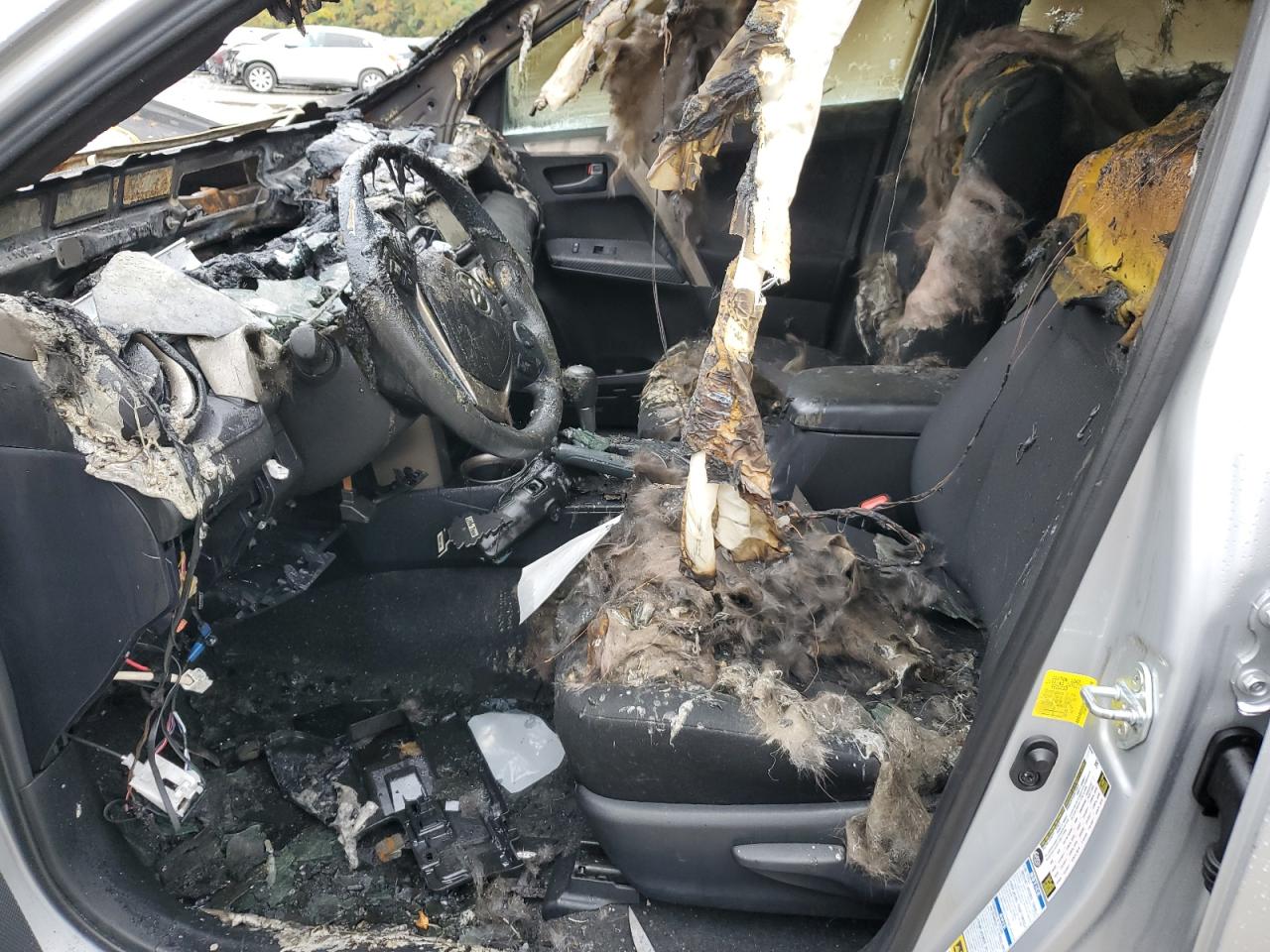 2015 Toyota RAV 4 VIN 2T3BFREV3FW299844 Copart auction photo, burn damage thumbnail 7
