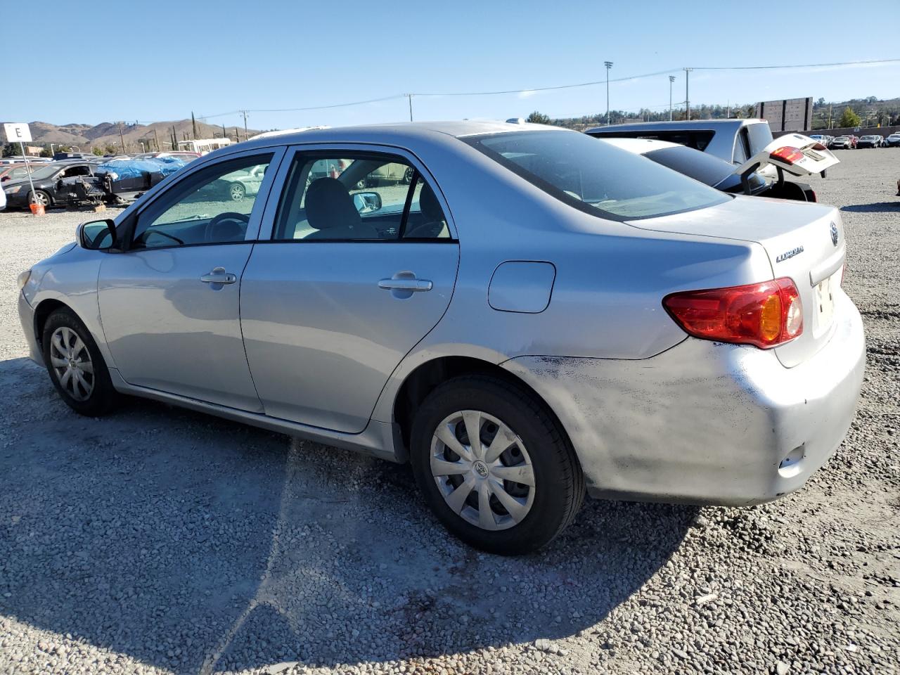 2010 Toyota Corolla VIN 1NXBU4EE7AZ292406 Copart auction photo, front end / side damage thumbnail 2