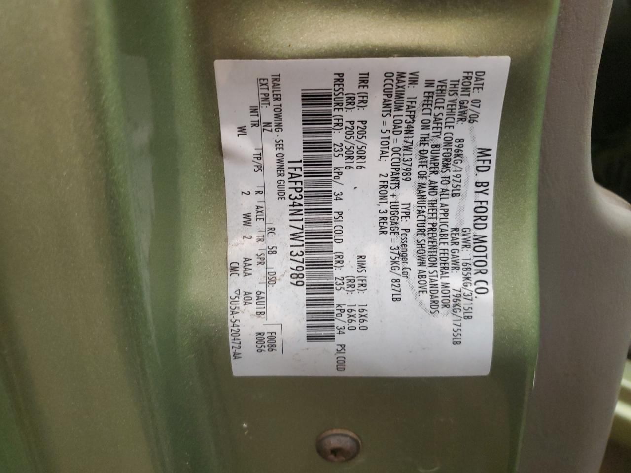 2007 Ford Focus VIN 1FAFP34N17W137989 Copart auction photo, front end / side damage thumbnail 12