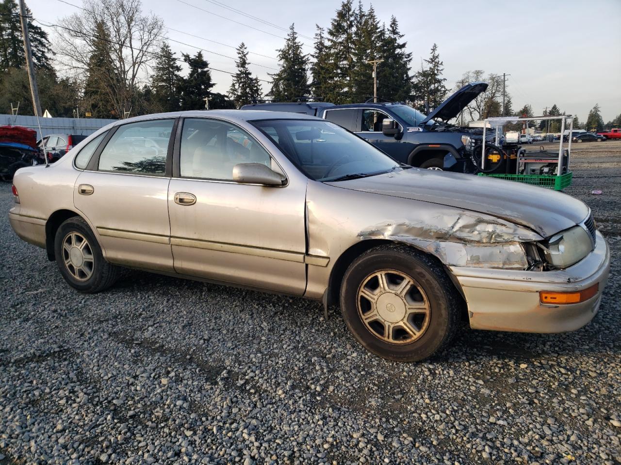 1996 Toyota Avalon VIN 4T1BF12B0TU128775 Copart auction photo, side / front end damage thumbnail 4