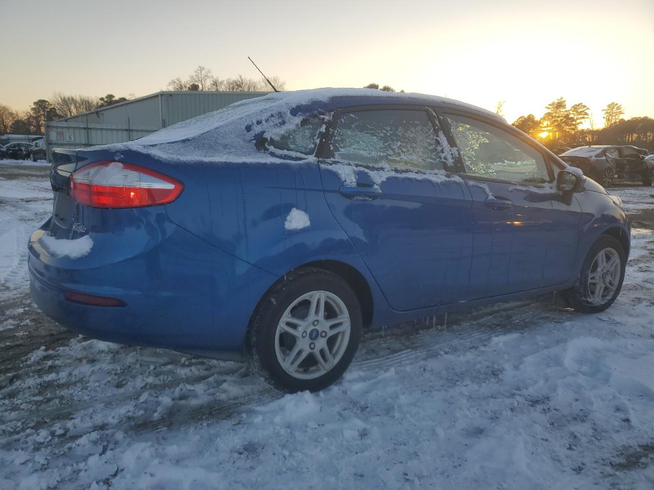2018 Ford Fiesta VIN 3FADP4BJ6JM138656 Copart auction photo, side / front end damage thumbnail 3